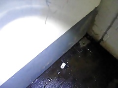 pissing in a well used corner in the parking garage