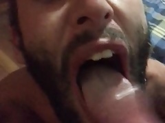 Taking a facial from a black uncut cock
